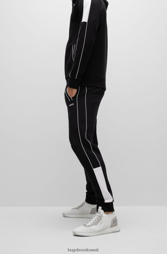 4TFNJN1025 أسود Hugo Boss بدلة رياضية من مزيج القطن باللون الأسود من Hugo مع أشرطة وشعارات