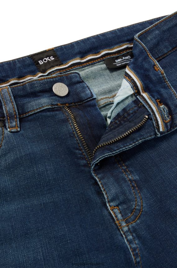 4TFNJN1042 أزرق غامق Hugo Boss جينز هوغو ذو قصة ضيقة باللون الأزرق الداكن من قماش الدنيم النيلي فائق التمدد
