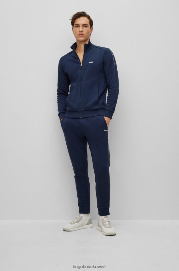 4TFNJN1043 أزرق غامق Hugo Boss بدلة رياضية بشعار Hugo باللون الأزرق الداكن ومصنوعة من القطن ذو وجهين