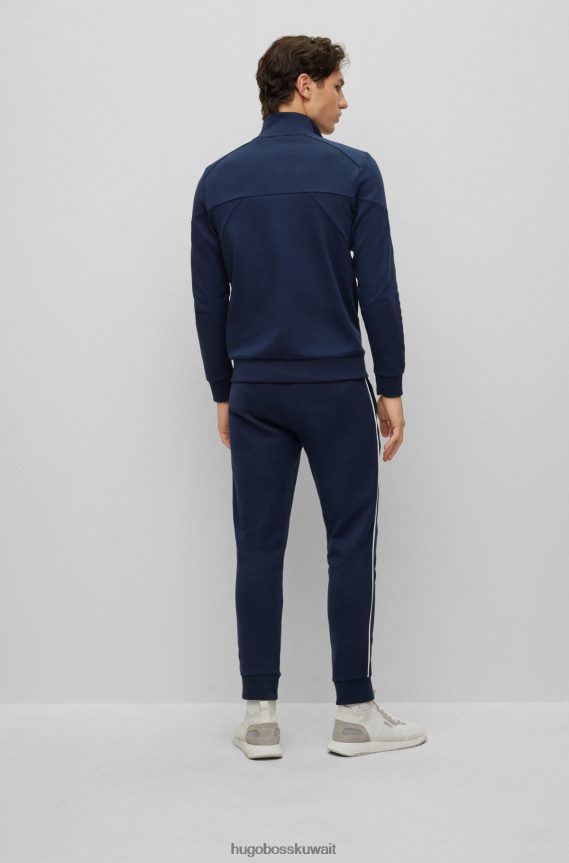 4TFNJN1043 أزرق غامق Hugo Boss بدلة رياضية بشعار Hugo باللون الأزرق الداكن ومصنوعة من القطن ذو وجهين