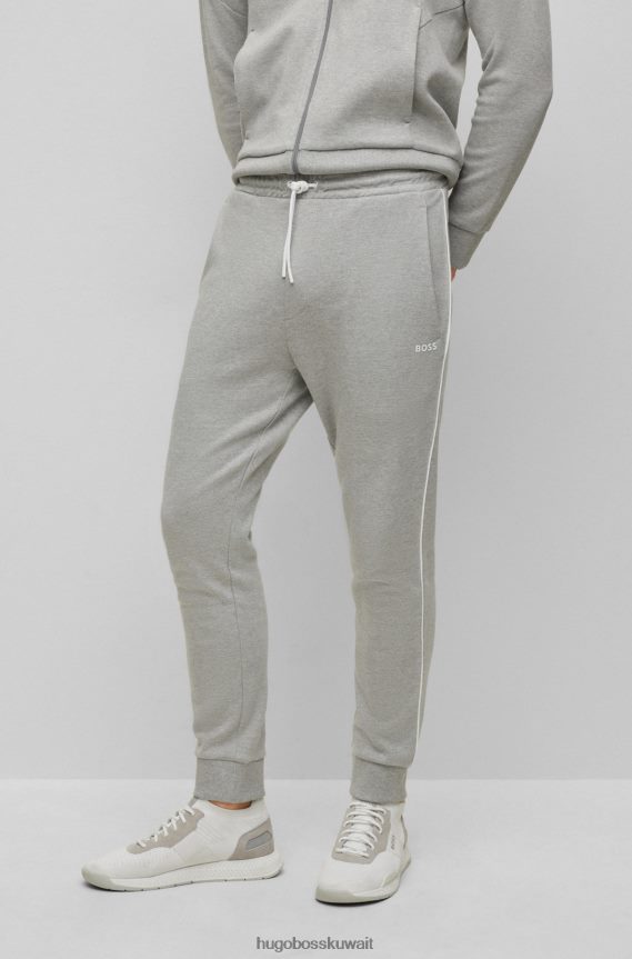 4TFNJN1044 رمادي فاتح Hugo Boss بدلة رياضية بشعار Hugo ذات مقاس عادي من القطن ذو الوجهين باللون الرمادي الفاتح