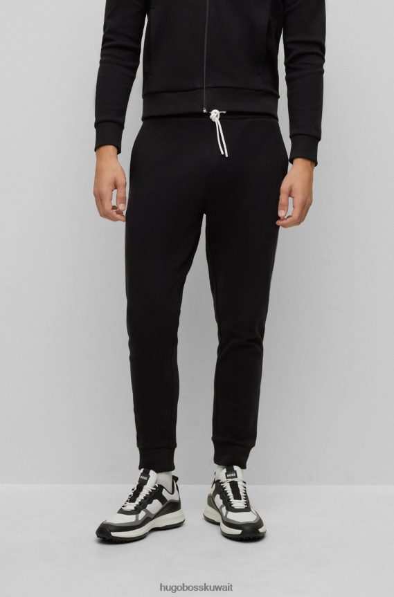 4TFNJN1046 أسود Hugo Boss بدلة رياضية سوداء بشعار الماركة بقصة عادية مصنوعة من قطن هوغو مزدوج الوجه