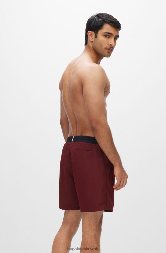 4TFNJN1075 احمر غامق Hugo Boss شورت سباحة بشعار متباين مصنوع من مادة معاد تدويرها باللون الأحمر الداكن