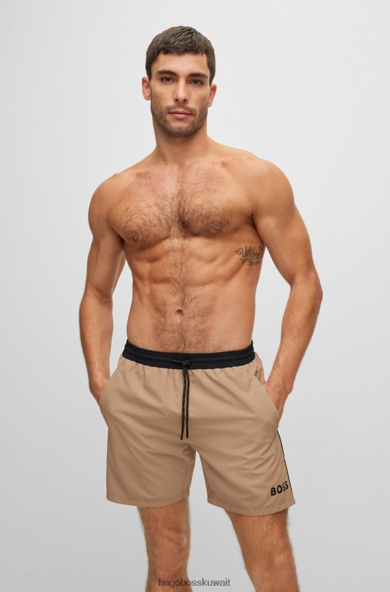 4TFNJN1080 اللون البيج Hugo Boss شورت سباحة بشعار متباين من Hugo مصنوع من مادة معاد تدويرها باللون البيج