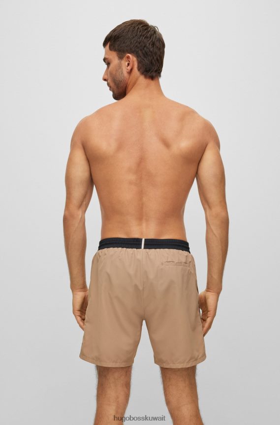 4TFNJN1080 اللون البيج Hugo Boss شورت سباحة بشعار متباين من Hugo مصنوع من مادة معاد تدويرها باللون البيج