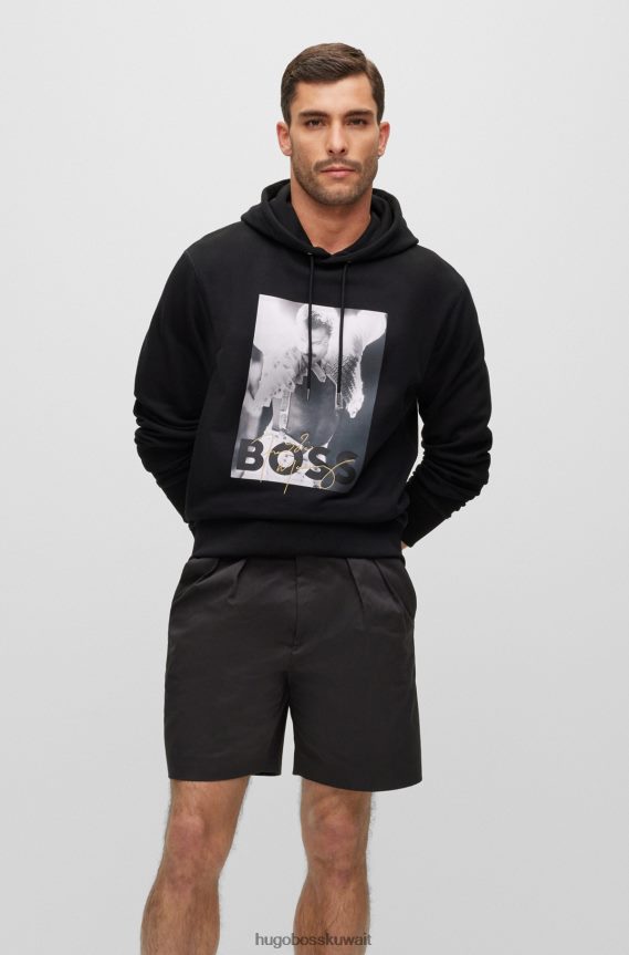 4TFNJN1118 أسود Hugo Boss سترة بغطاء للرأس من قطن تيري باللون الأسود مع عمل فني حصري من هوغو