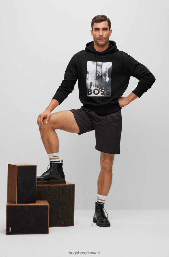 4TFNJN1118 أسود Hugo Boss سترة بغطاء للرأس من قطن تيري باللون الأسود مع عمل فني حصري من هوغو