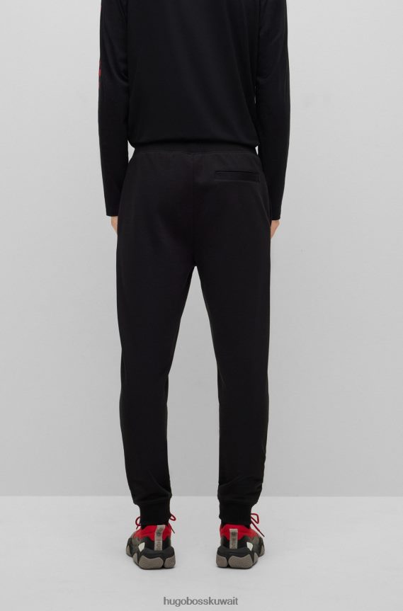 4TFNJN1123 أسود Hugo Boss بدلة رياضية من قطن تيري مع شعار عمل فني باللون الأسود من هوغو