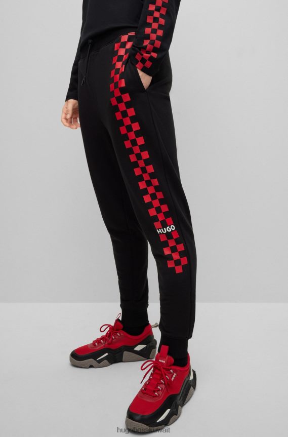 4TFNJN1123 أسود Hugo Boss بدلة رياضية من قطن تيري مع شعار عمل فني باللون الأسود من هوغو