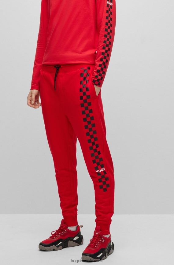 4TFNJN1124 أحمر Hugo Boss قطعة سفلية رياضية من قطن تيري باللون الأحمر مع شعار Hugo الفني
