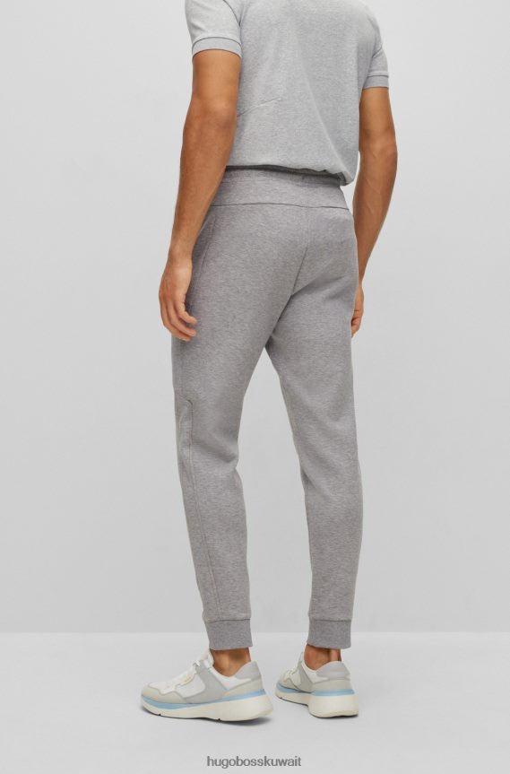 4TFNJN1136 رمادي فاتح Hugo Boss بدلة رياضية من مزيج القطن باللون الرمادي الفاتح مع عمل فني شبكي