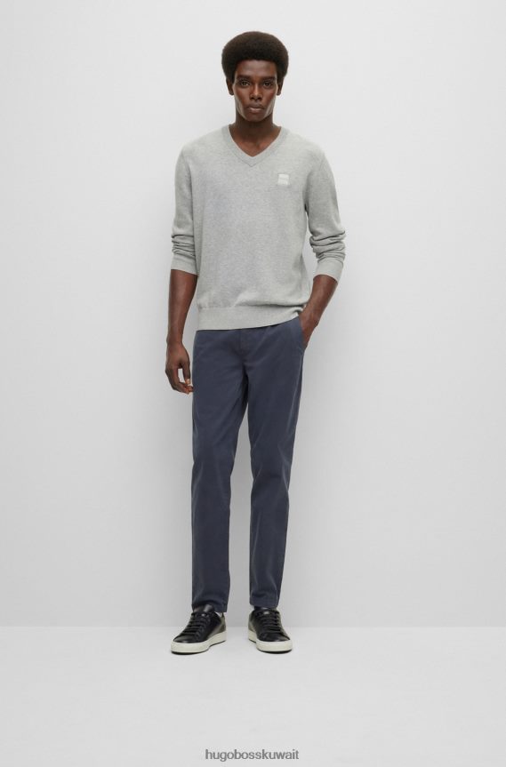 4TFNJN1259 أزرق غامق Hugo Boss تشينو بقصّة مدببة من الساتان القطني المصبوغ باللون الأزرق الداكن