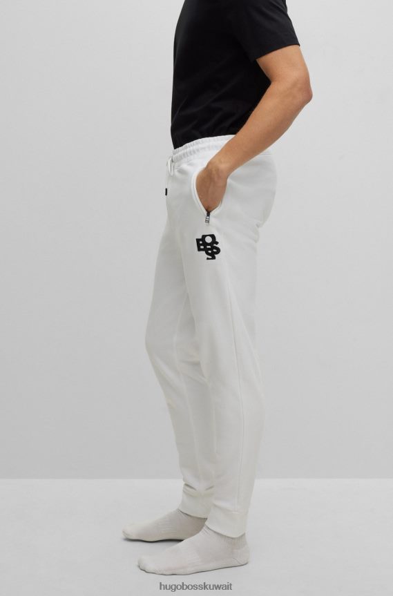 4TFNJN1271 أبيض Hugo Boss بدلة رياضية فرينش تيري مع شعارات مهزوزة باللون الأبيض من هوغو