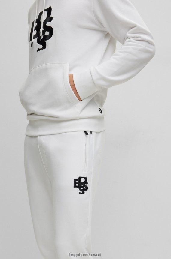 4TFNJN1271 أبيض Hugo Boss بدلة رياضية فرينش تيري مع شعارات مهزوزة باللون الأبيض من هوغو
