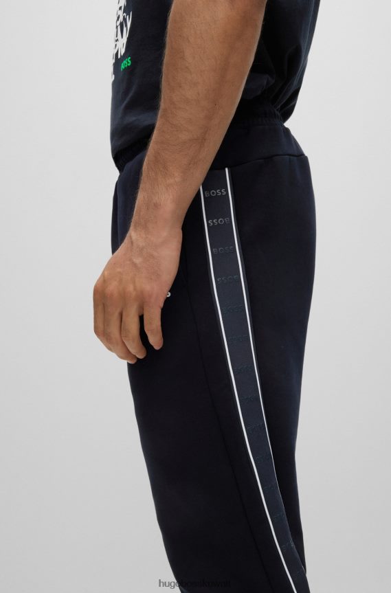 4TFNJN1284 أزرق غامق Hugo Boss بدلة رياضية من مزيج القطن باللون الأزرق الداكن مع شريط شعار هوغو