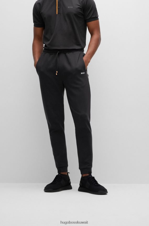 4TFNJN1286 أسود Hugo Boss بدلة رياضية من مزيج القطن من Hugo باللون الأسود مع شريط الشعار