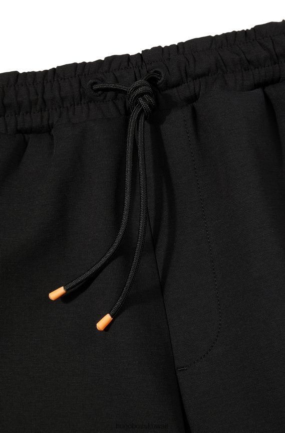 4TFNJN1286 أسود Hugo Boss بدلة رياضية من مزيج القطن من Hugo باللون الأسود مع شريط الشعار