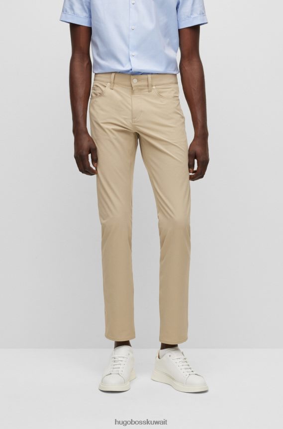 4TFNJN1404 البيج الفاتح Hugo Boss بنطال جينز ضيق باللون البيج الفاتح من قماش الدنيم المطاطي المقاوم للماء