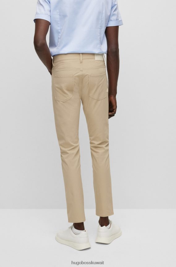 4TFNJN1404 البيج الفاتح Hugo Boss بنطال جينز ضيق باللون البيج الفاتح من قماش الدنيم المطاطي المقاوم للماء