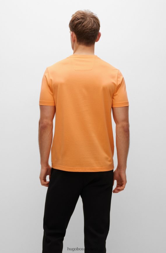 4TFNJN1411 برتقالي فاتح Hugo Boss تي شيرت من مزيج القطن مع عمل فني يتوهج في الظلام هوغو برتقالي فاتح