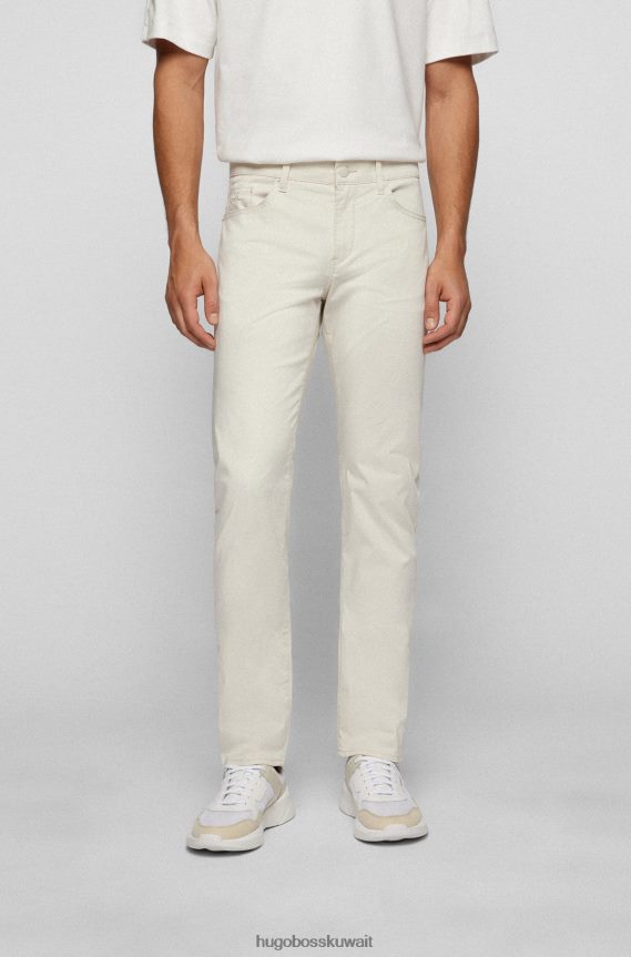 4TFNJN1433 البيج الفاتح Hugo Boss بنطال جينز بقصّة ضيّقة مصنوع من قماش الدنيم المصنوع من قطن الساتان المطاطي باللون البيج الفاتح