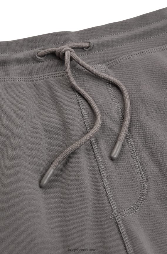 4TFNJN1434 رمادي Hugo Boss بدلة رياضية من قطن تيري باللون الرمادي مع رقعة شعار هوغو