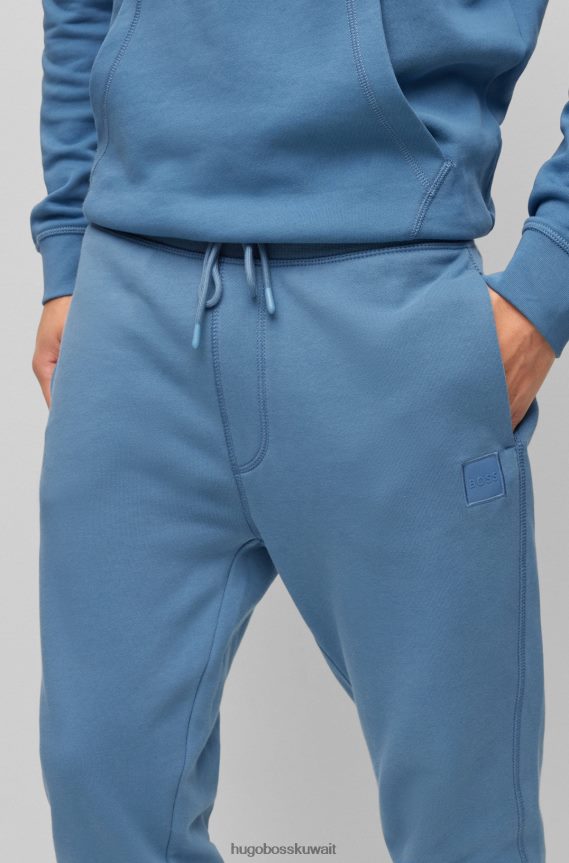 4TFNJN1435 أزرق فاتح Hugo Boss بدلة رياضية من قطن تيري مع رقعة شعار هوغو باللون الأزرق الفاتح