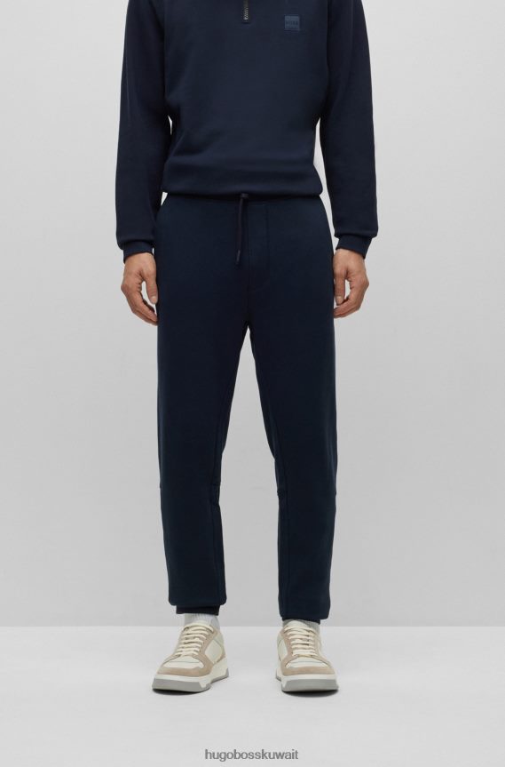 4TFNJN1436 أزرق غامق Hugo Boss بدلة رياضية من قطن تيري من هوغو باللون الأزرق الداكن مع رقعة الشعار