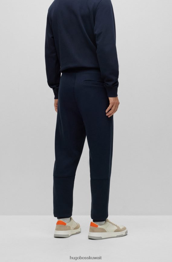 4TFNJN1436 أزرق غامق Hugo Boss بدلة رياضية من قطن تيري من هوغو باللون الأزرق الداكن مع رقعة الشعار
