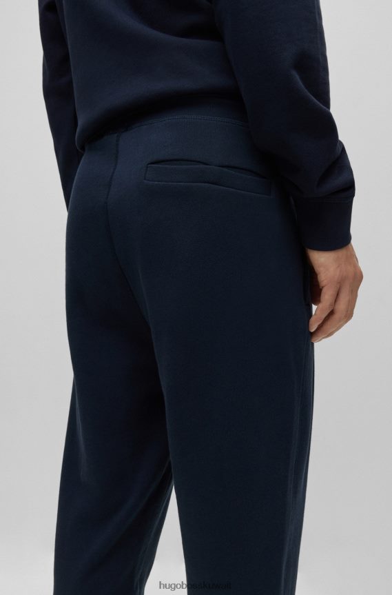 4TFNJN1436 أزرق غامق Hugo Boss بدلة رياضية من قطن تيري من هوغو باللون الأزرق الداكن مع رقعة الشعار