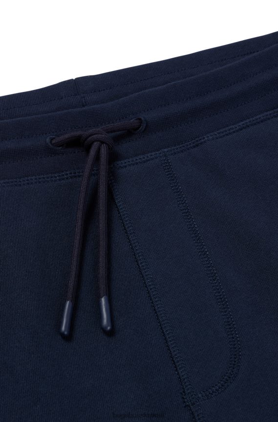 4TFNJN1436 أزرق غامق Hugo Boss بدلة رياضية من قطن تيري من هوغو باللون الأزرق الداكن مع رقعة الشعار