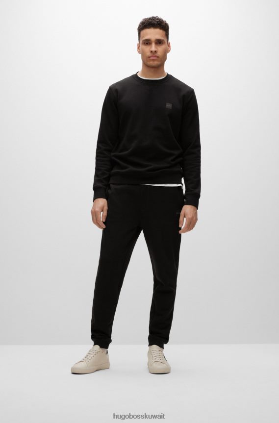 4TFNJN1440 أسود Hugo Boss بدلة رياضية من قطن تيري باللون الأسود مع رقعة شعار هوغو