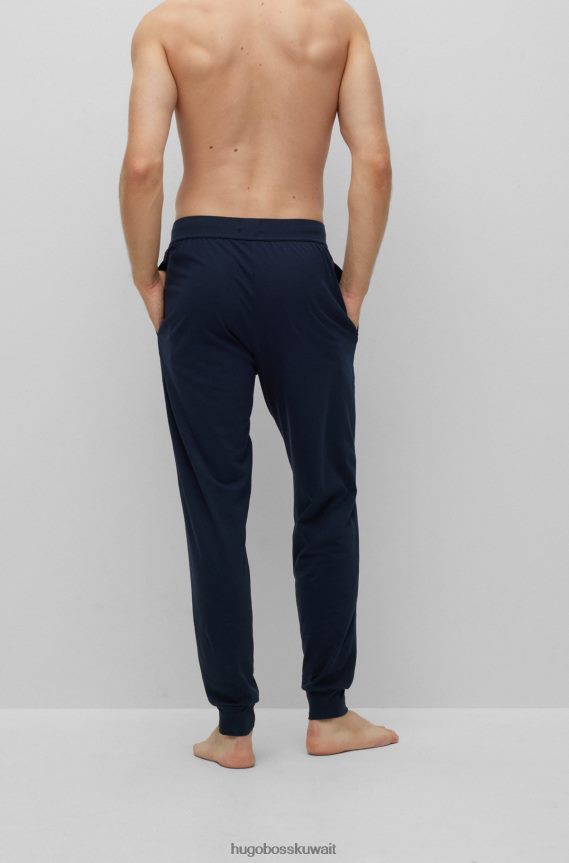 4TFNJN1442 أزرق غامق Hugo Boss بنطلون بيجامة من القطن المطاطي من هوغو باللون الأزرق الداكن مع طباعة الشعار