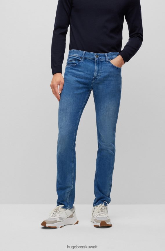 4TFNJN1457 أزرق Hugo Boss بنطال جينز بقصّة ضيّقة من قماش الدنيم الأزرق بلمسة من الكشمير الإيطالي باللون الأزرق
