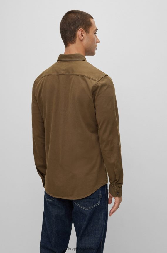 4TFNJN1514 أخضر غامق Hugo Boss قميص Hugo ذو قصة ضيقة مصنوع من قطن الجيرسيه مع أزرار مطاطية باللون الأخضر الداكن