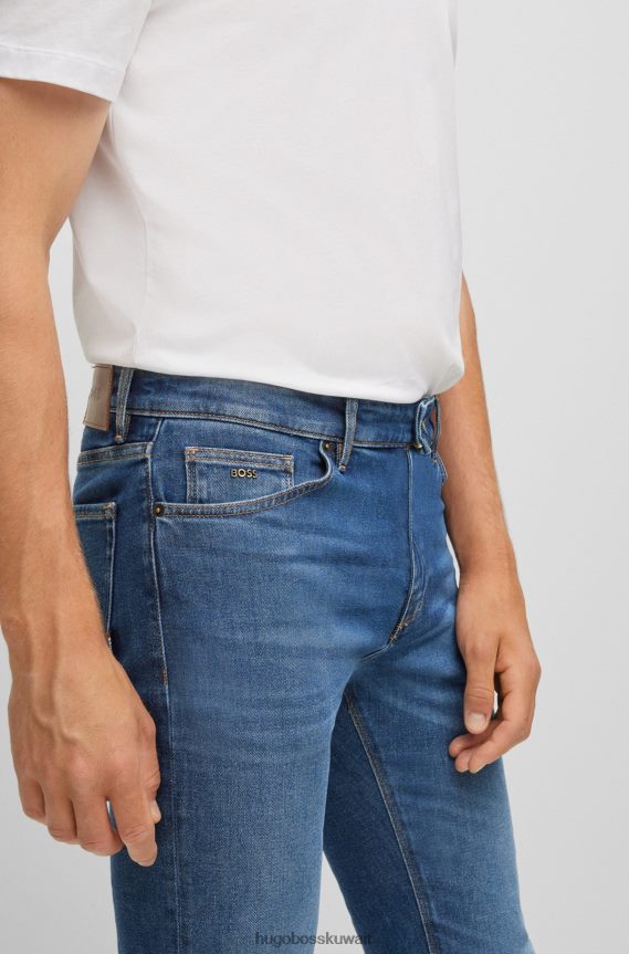 4TFNJN1541 أزرق غامق Hugo Boss جينز بقصة عادية من قماش الدنيم المريح والمطاط باللون الأزرق الداكن