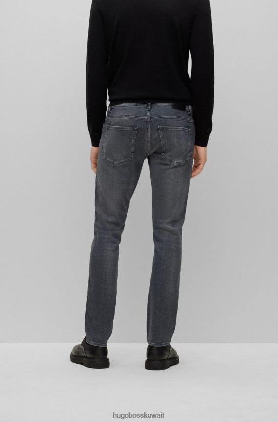 4TFNJN1565 رمادي Hugo Boss بنطال جينز رمادي بقصة ضيقة من قماش الدنيم الإيطالي فائق النعومة باللون الأزرق