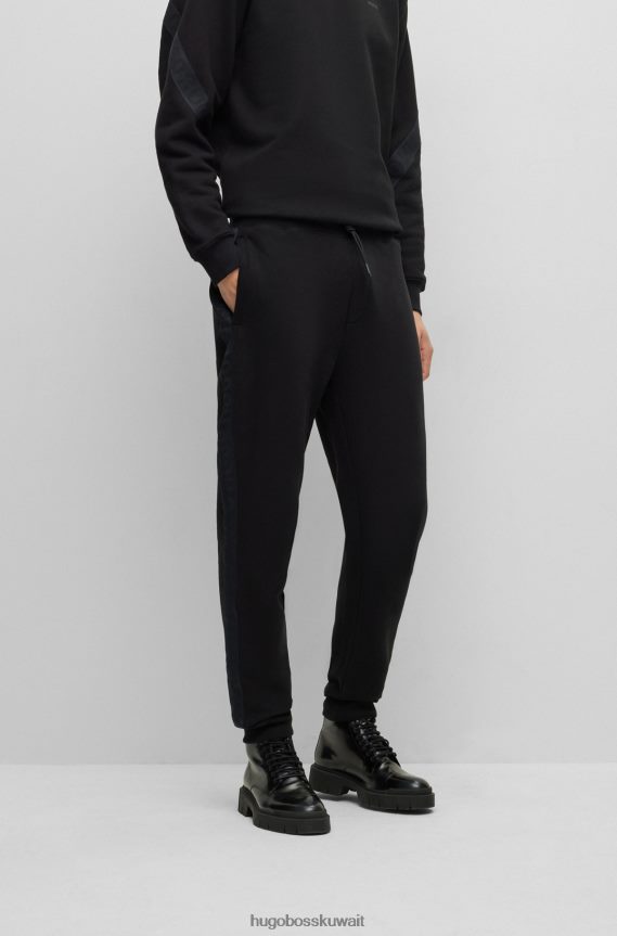 4TFNJN1574 أسود Hugo Boss بدلة رياضية من القطن العضوي باللون الأسود من Hugo مع شريط الشعار