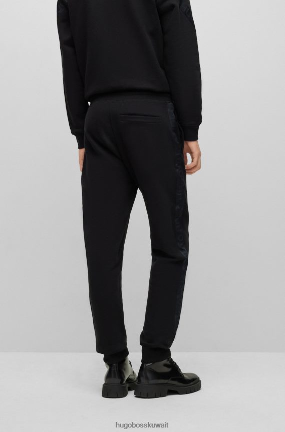 4TFNJN1574 أسود Hugo Boss بدلة رياضية من القطن العضوي باللون الأسود من Hugo مع شريط الشعار