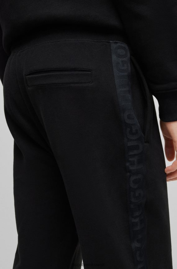 4TFNJN1574 أسود Hugo Boss بدلة رياضية من القطن العضوي باللون الأسود من Hugo مع شريط الشعار