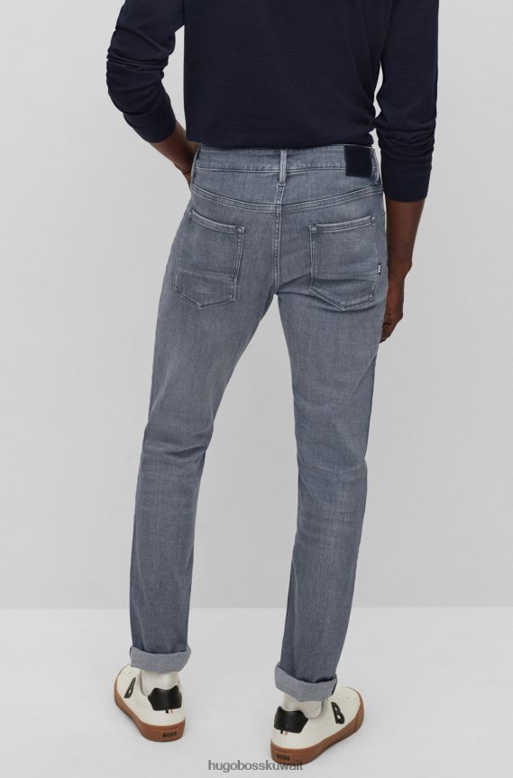 4TFNJN1609 رمادي Hugo Boss بنطال جينز رمادي بقصّة ضيّقة للغاية من قماش الدنيم الرمادي بلمسة من الكشمير