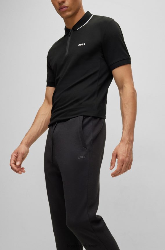 4TFNJN1610 أسود Hugo Boss قيعان رياضية من مواد مختلطة مع شعار منحني باللون الأسود