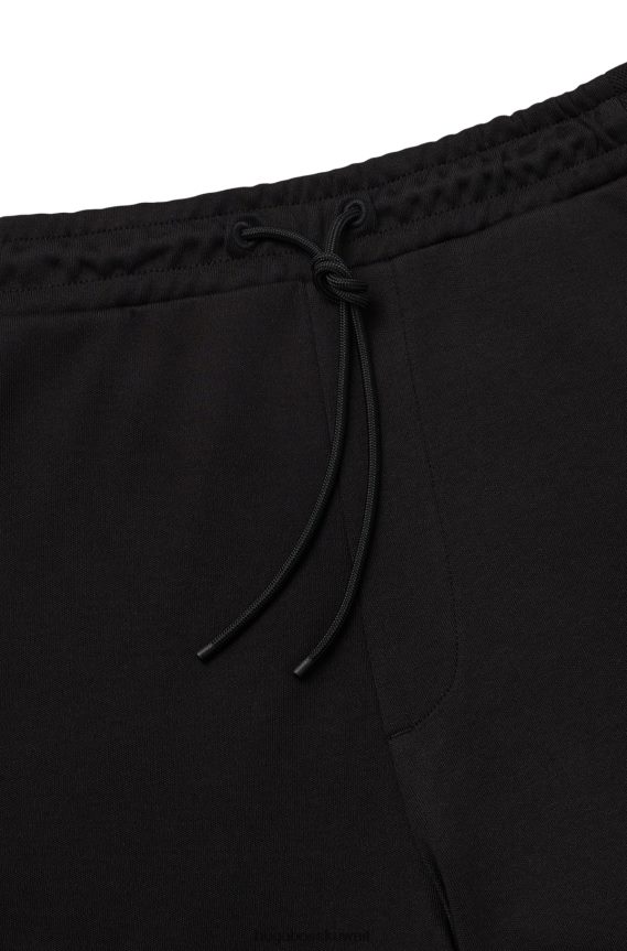 4TFNJN1610 أسود Hugo Boss قيعان رياضية من مواد مختلطة مع شعار منحني باللون الأسود