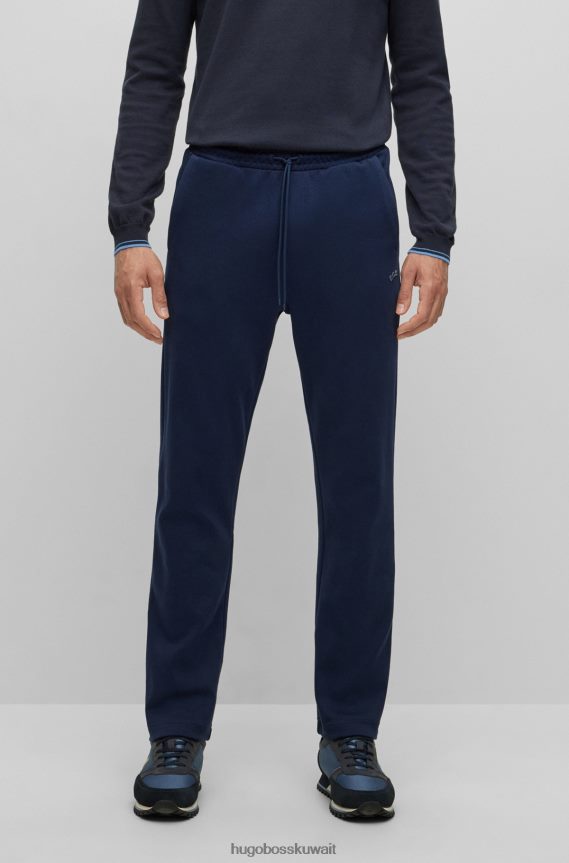 4TFNJN1611 أزرق غامق Hugo Boss سروال رياضي من مواد مختلطة من Hugo باللون الأزرق الداكن مع شعار منحني