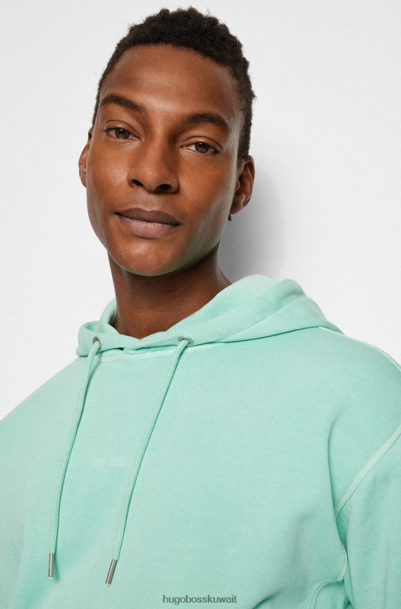 4TFNJN1679 اخضر فاتح Hugo Boss سترة بغطاء للرأس من قماش تيري القطني المصبوغ من Hugo مع شعار متناغم باللون الأخضر الفاتح