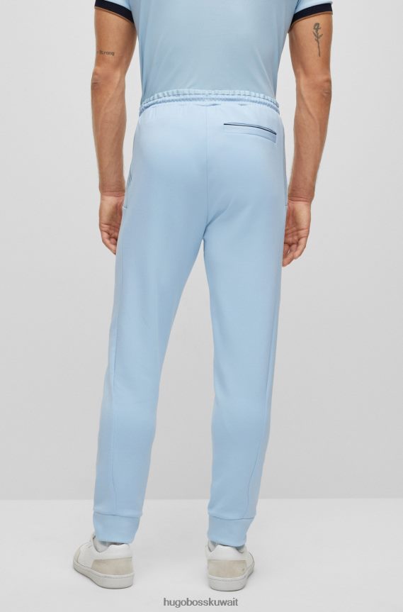 4TFNJN1733 أزرق فاتح Hugo Boss قطعة سفلية من بدلة رياضية من مزيج القطن من Hugo مع تفاصيل مخططة متعددة الألوان باللون الأزرق الفاتح