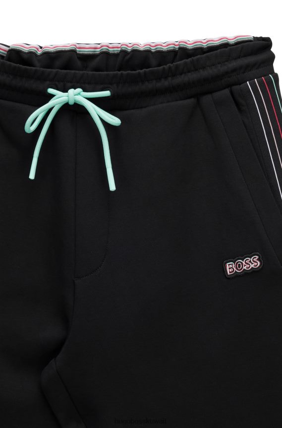 4TFNJN1734 أسود Hugo Boss بدلة رياضية من مزيج القطن مع تفاصيل مخططة متعددة الألوان باللون الأسود من Hugo