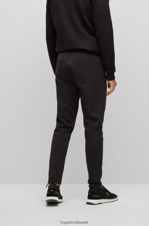 4TFNJN1741 أسود Hugo Boss بدلة رياضية سوداء بحاشية بسحاب مع تفاصيل مثقبة من Hugo