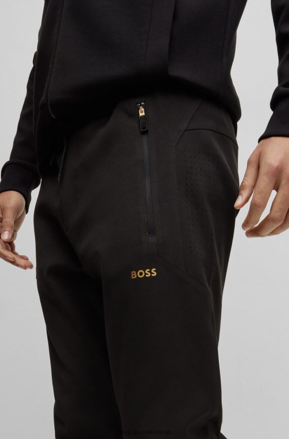 4TFNJN1741 أسود Hugo Boss بدلة رياضية سوداء بحاشية بسحاب مع تفاصيل مثقبة من Hugo