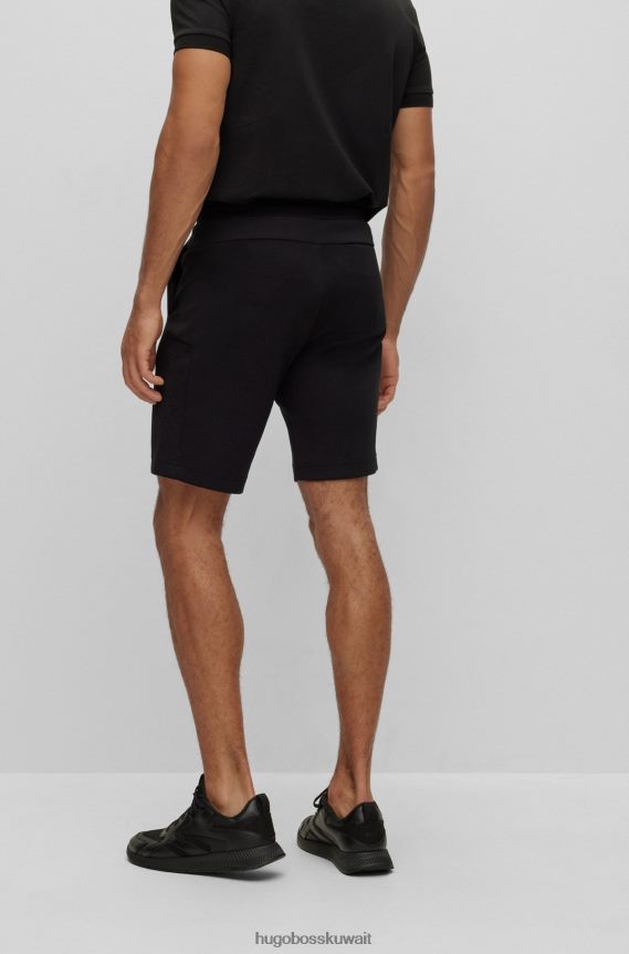4TFNJN1773 أسود Hugo Boss شورت هوغو أسود بقصة عادية مصنوع من قماش مطاطي مع عمل فني شبكي